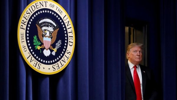 Trump signs NICA Act imposing imperialist sanctions on Nicaragua. Photo: Reuters/Telesur