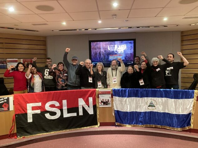 Participants at the European Solidarity Conference show their support for Nicaragua